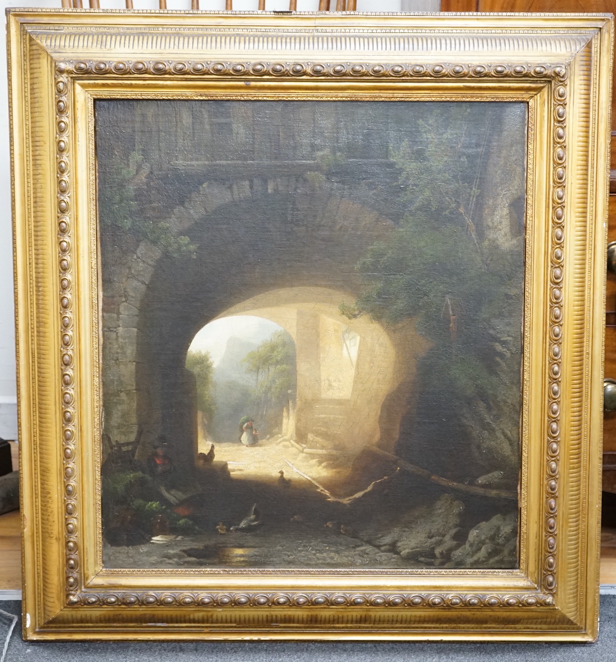 19th century French School, oil on canvas, Figures beneath an archway, 74 x 66cm